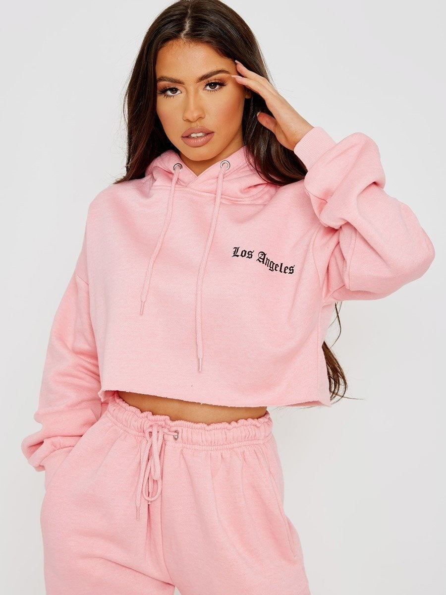 Cropped best sale pink tracksuit